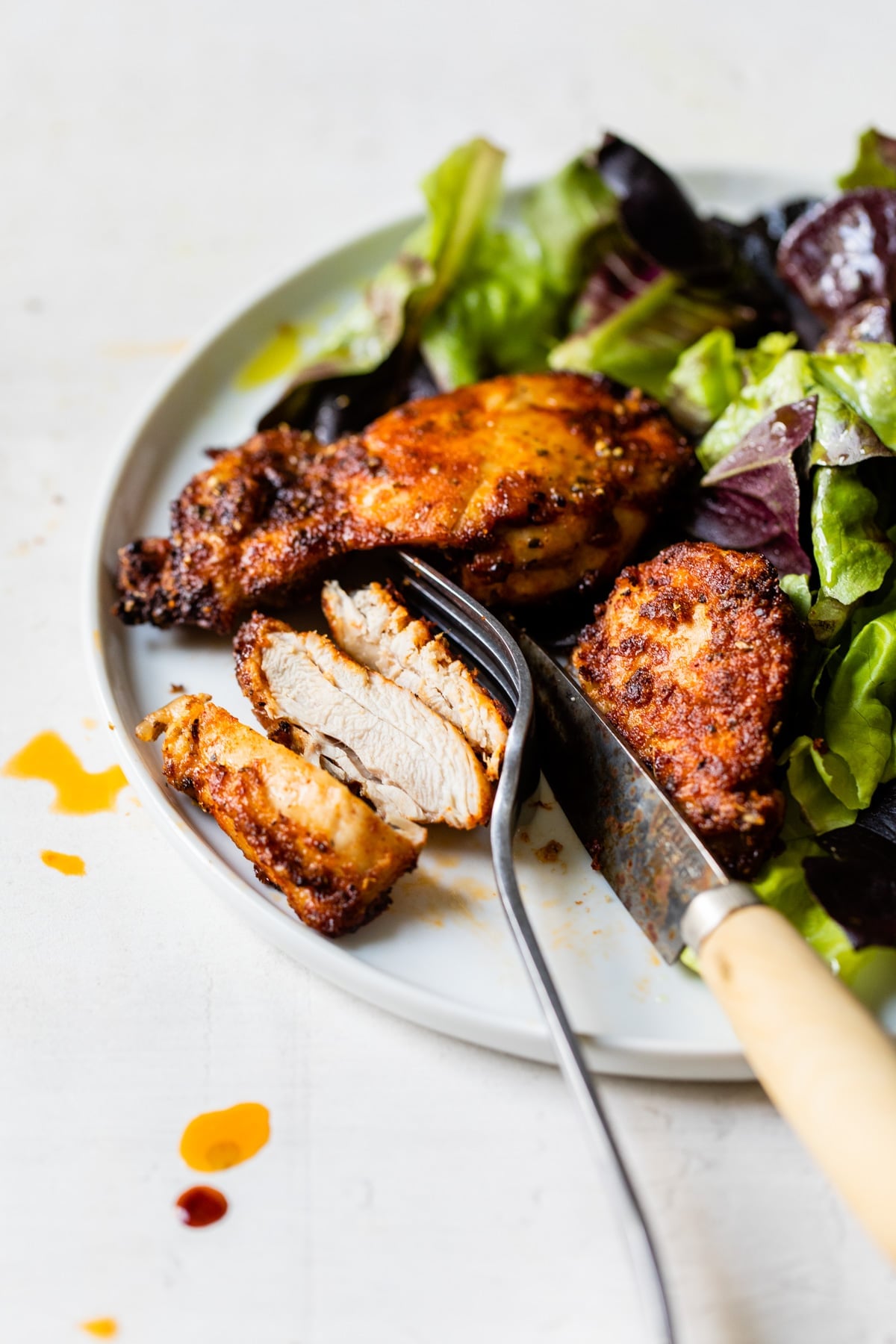chicken and salad on a plate
