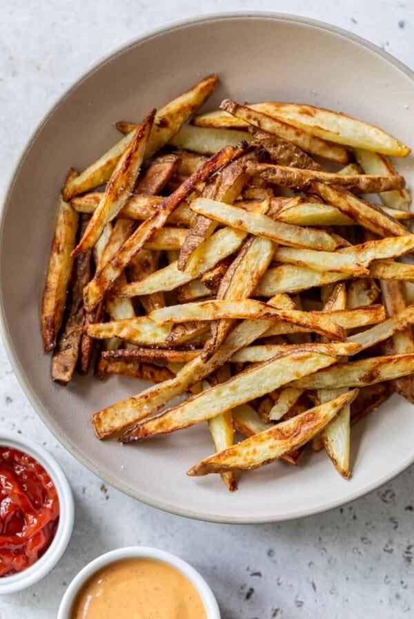 a bowl of air fryer french fries.