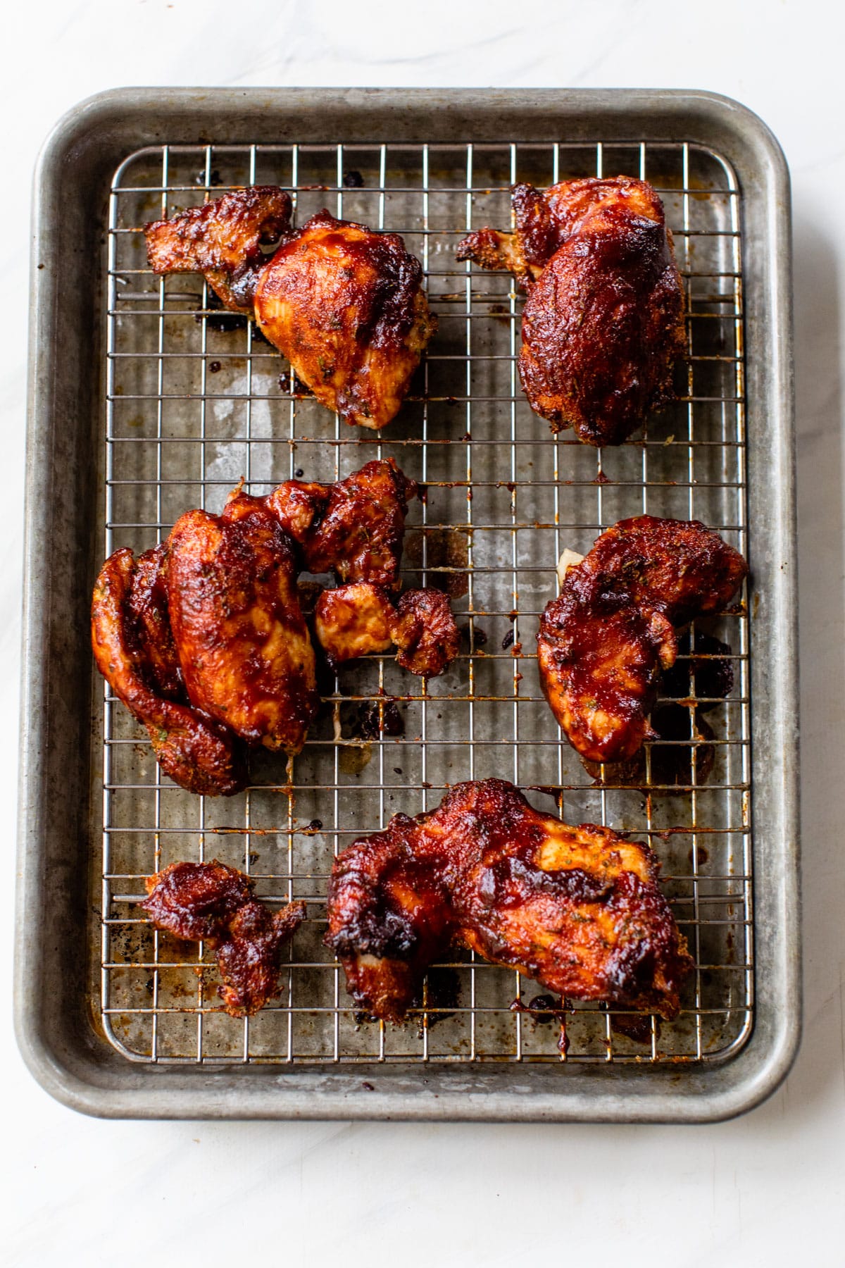 chicken thighs on a wire rack