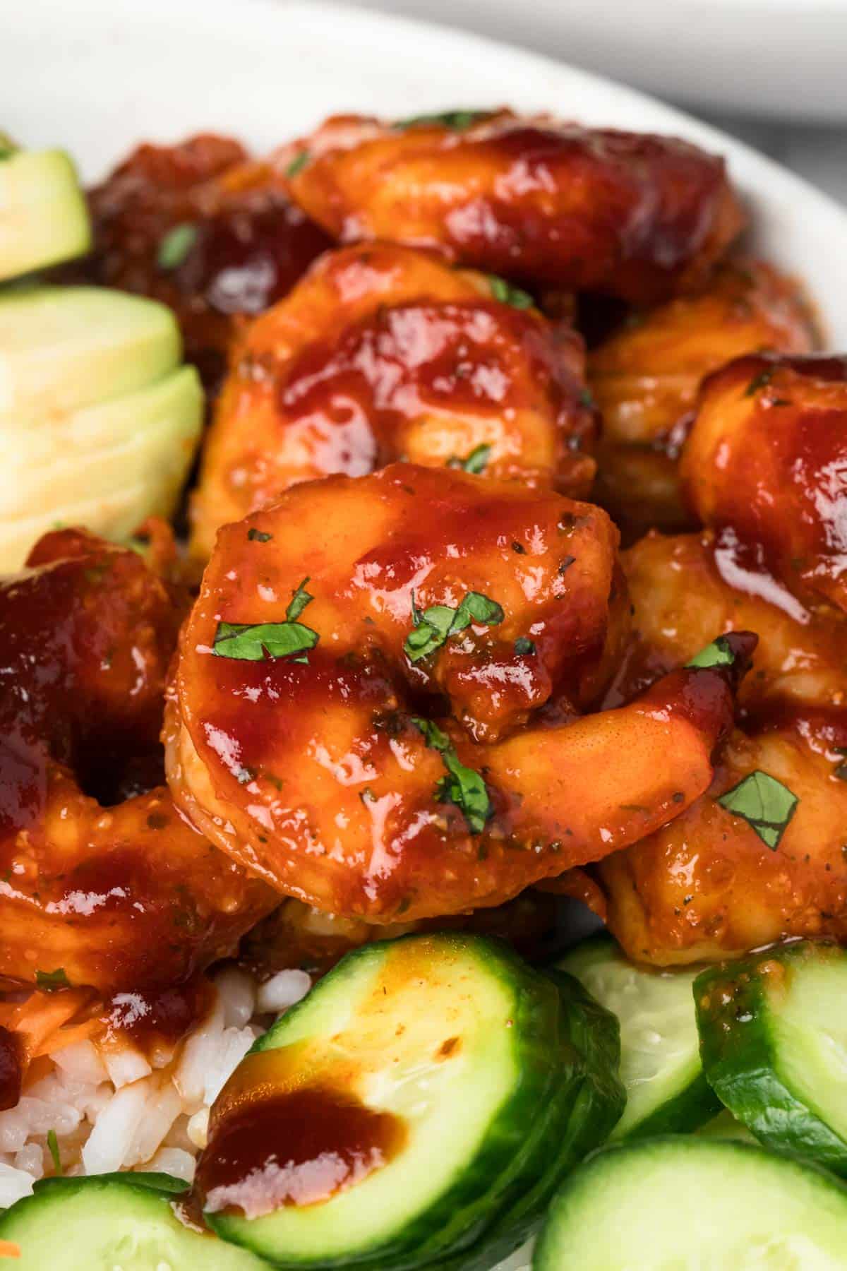 close up on BBQ shrimp on a BBQ shrimp bowl.