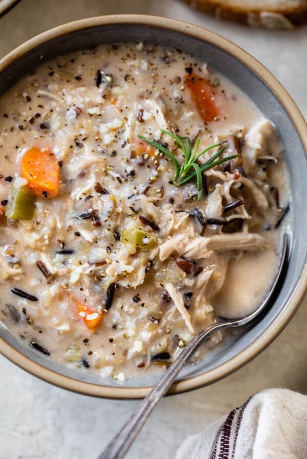 close-up of chicken wild rice soup in a bowl with a spoon