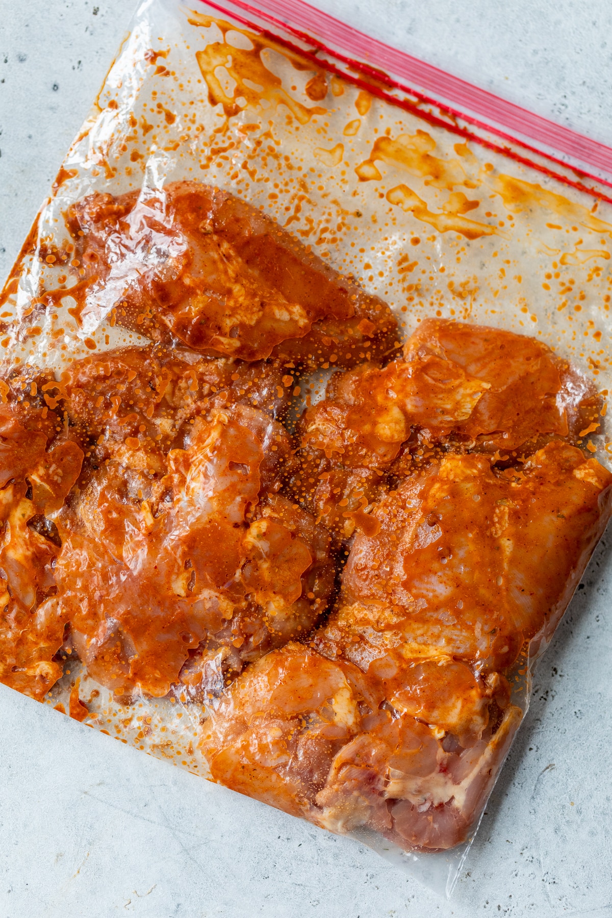 chicken thighs and a chipotle marinade in a large ziplock bag.
