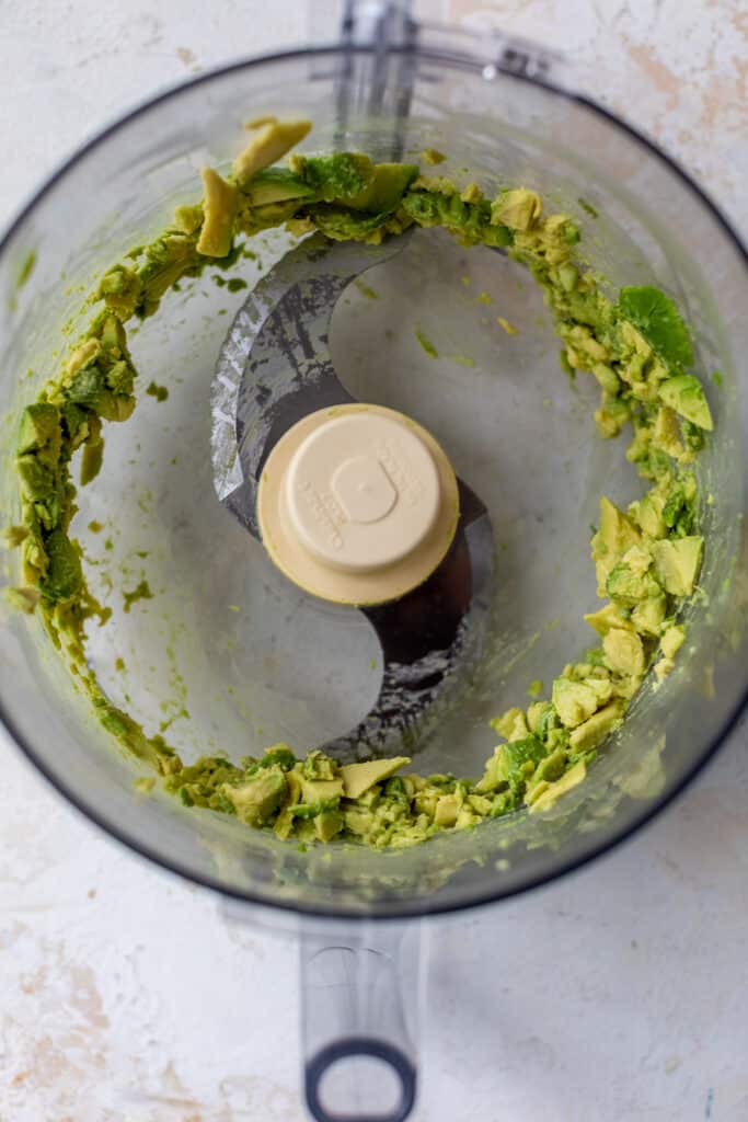 mashed avocado in a food processor.