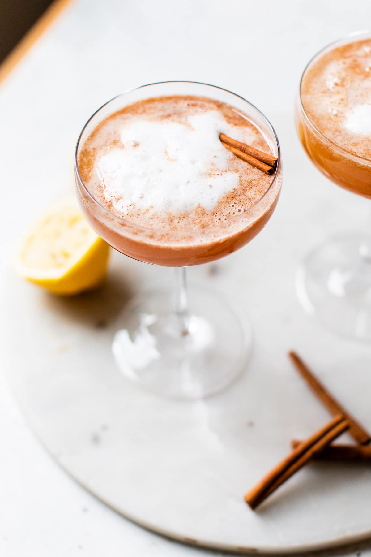 cocktail garnished with a cinnamon stick