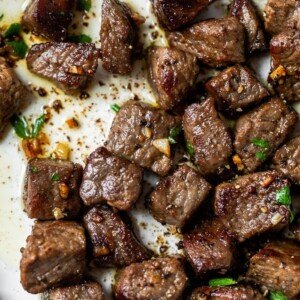 cut steak in a skillet