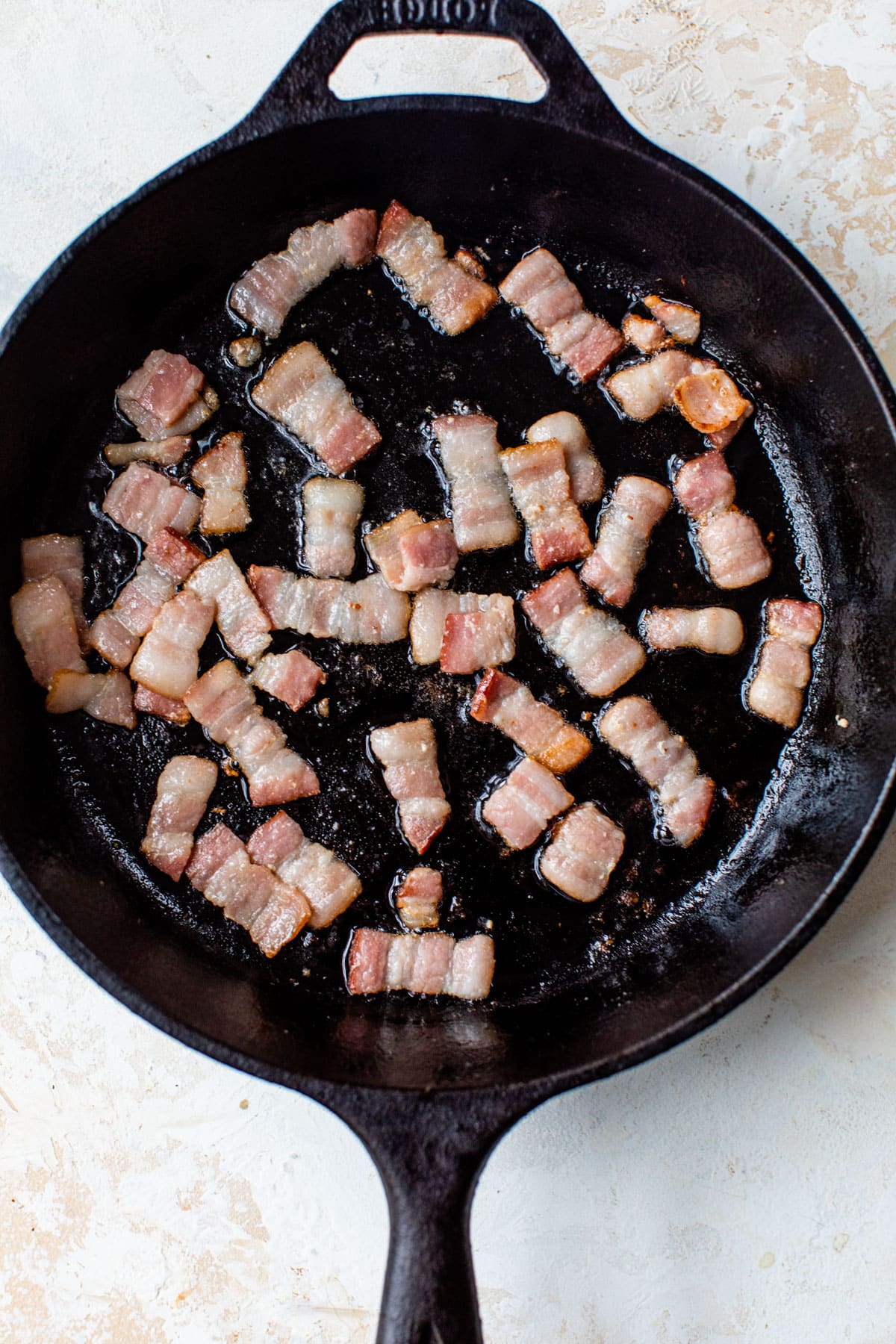 bacon cooking in a skillet