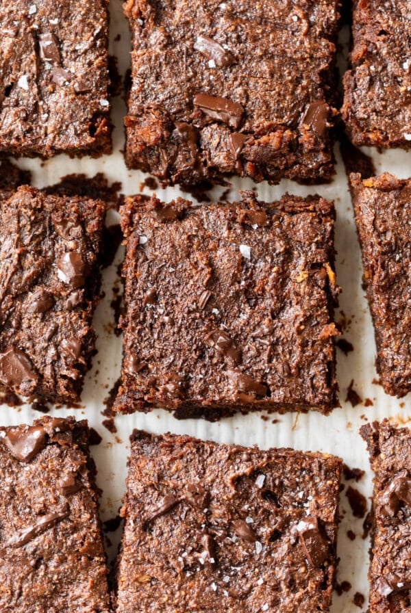 sliced brownies on parchment paper