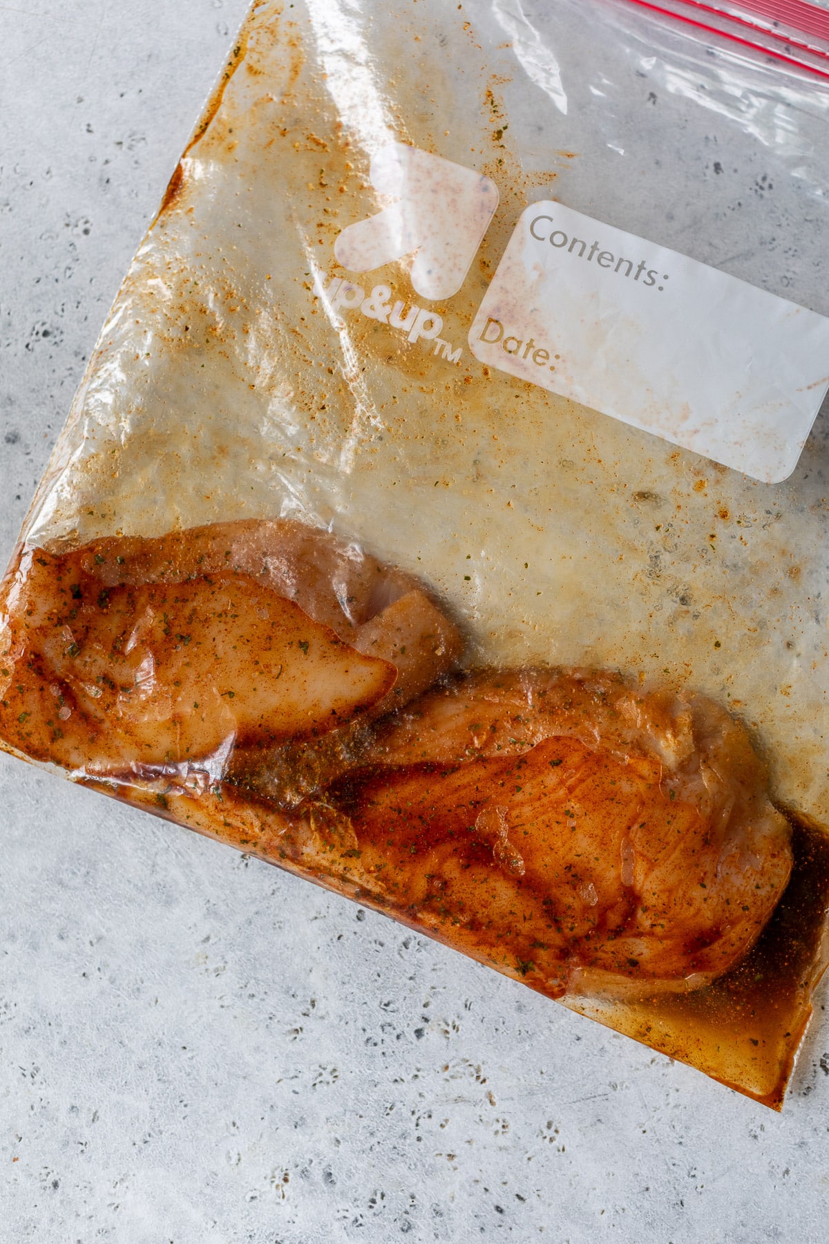 marinating 2 chicken breasts in a large ziplock bag.