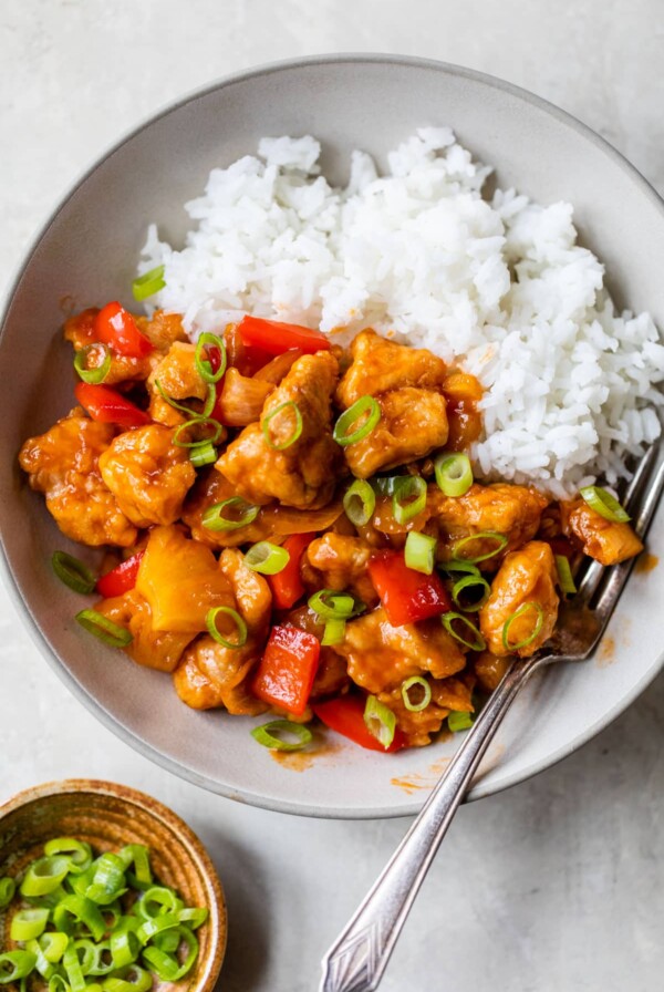 bowl of rice with sweet and sour chicken