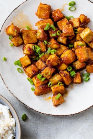 cooked sticky tofu on a plate