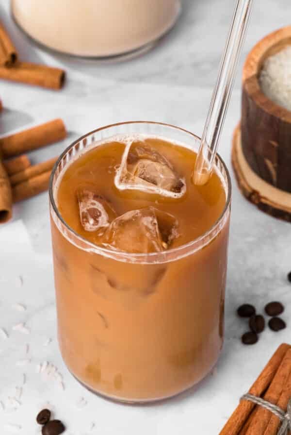 overhead view of an iced horchata latte in a glass.