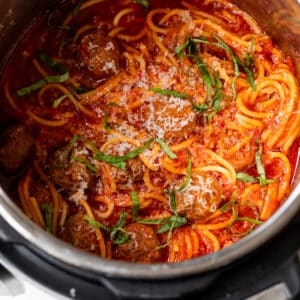 overhead view of spaghetti and meatballs in an instant pot.