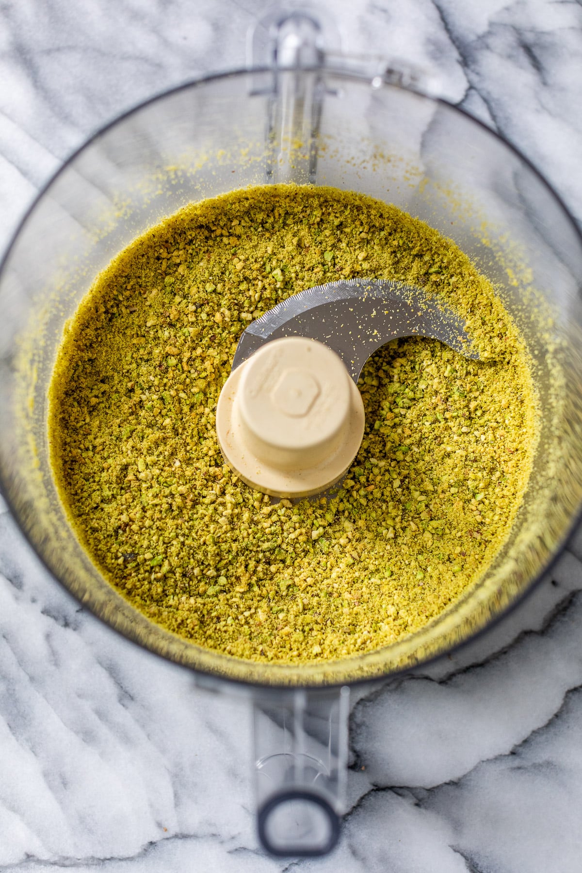 crushed pistachios in a food processor.
