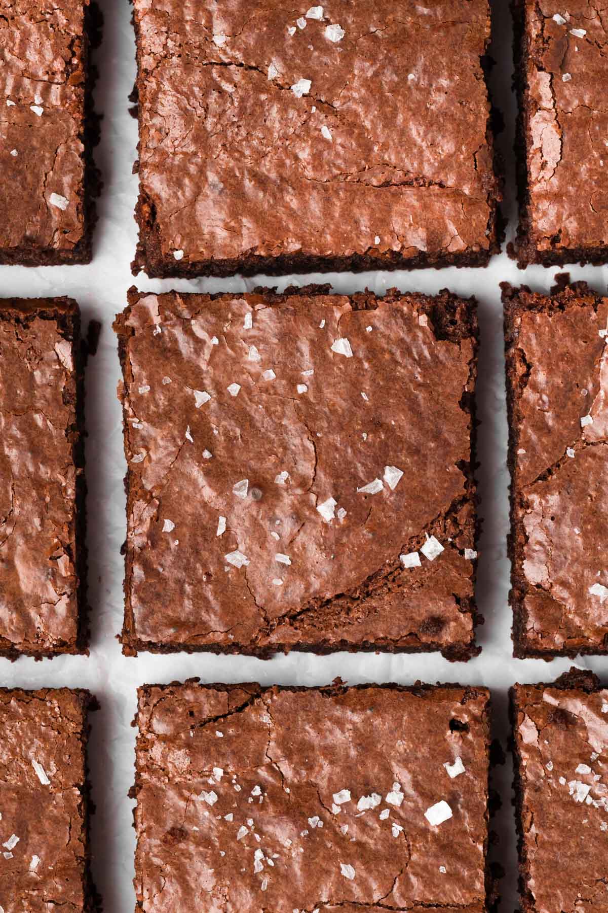 overhead view of sliced paleo brownies topped with sea salt.