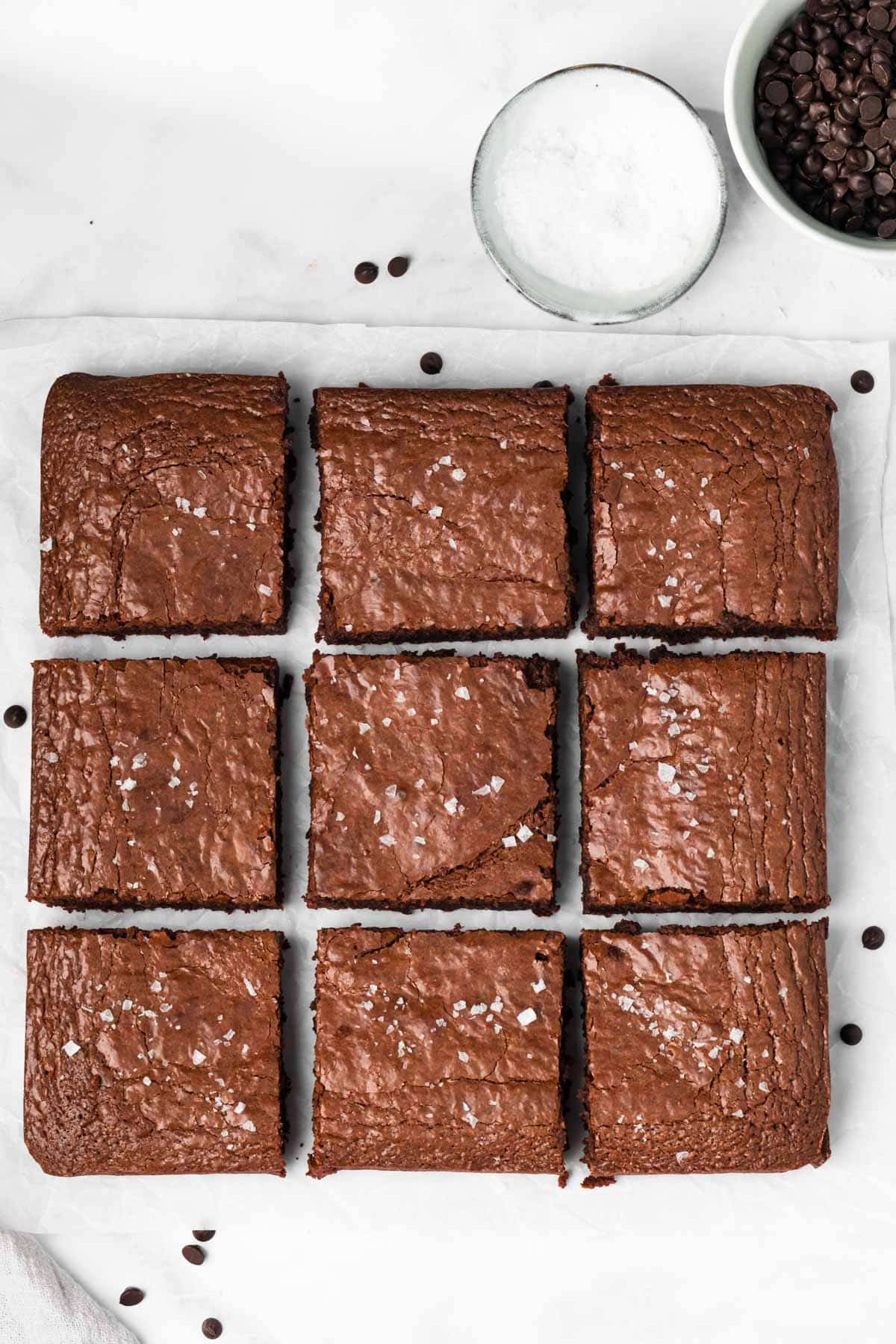 overhead view of sliced paleo brownies topped with sea salt.