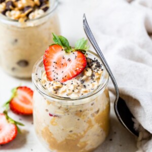 jar of oats with peanut butter and strawberries