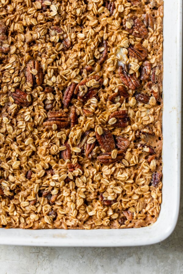baked oatmeal with pecans in a casserole dish