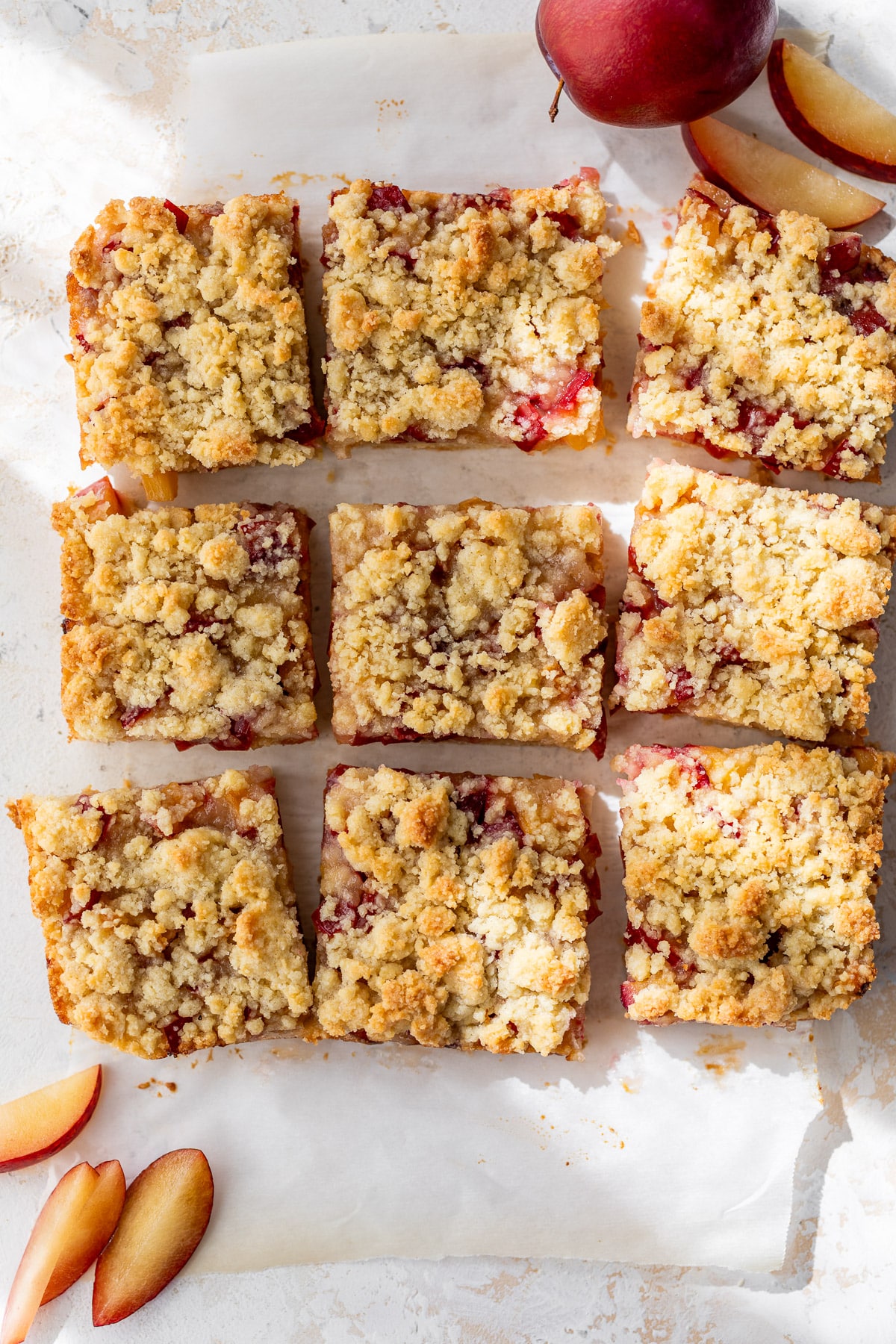 overhead view of sliced plum crumb bars.