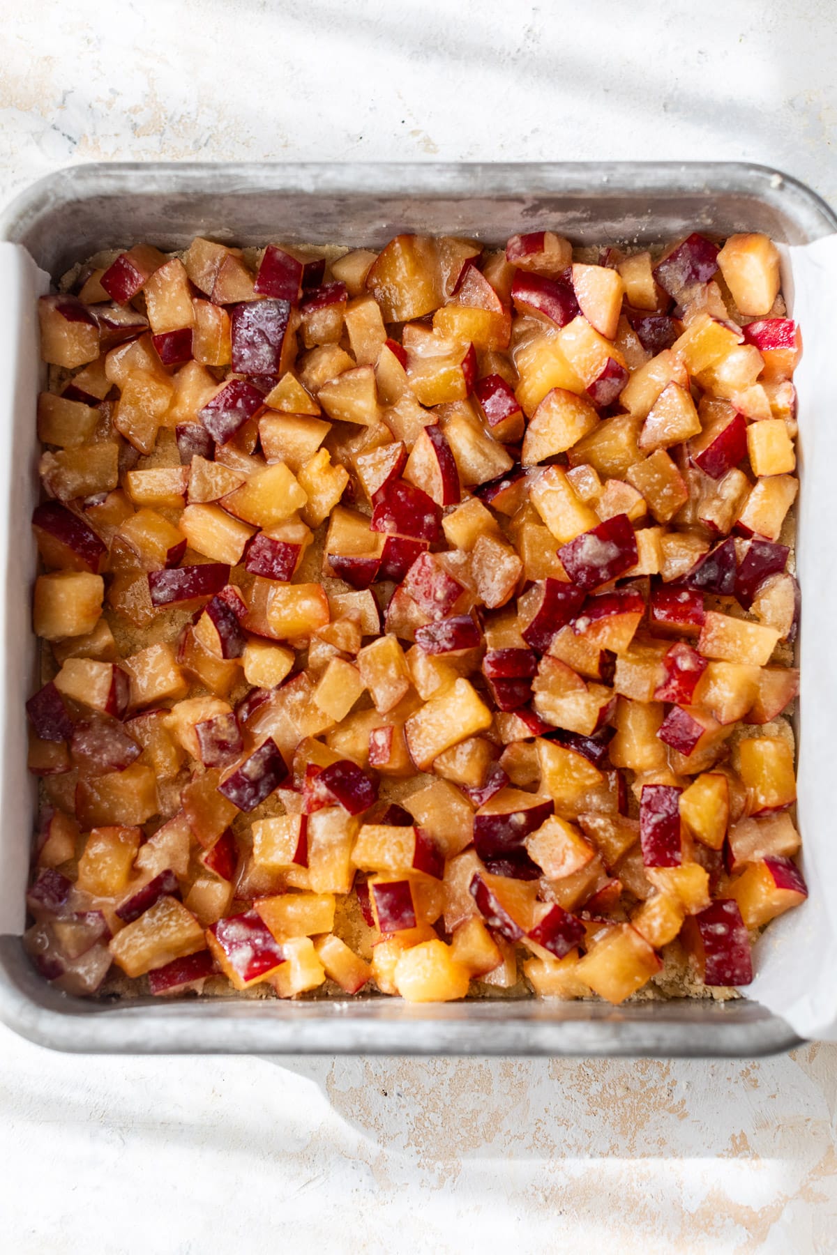 the plum filling for plum bars in a baking dish.