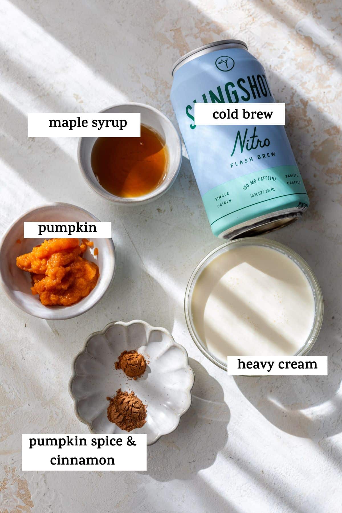 ingredients for pumpkin cream cold brew with labels.
