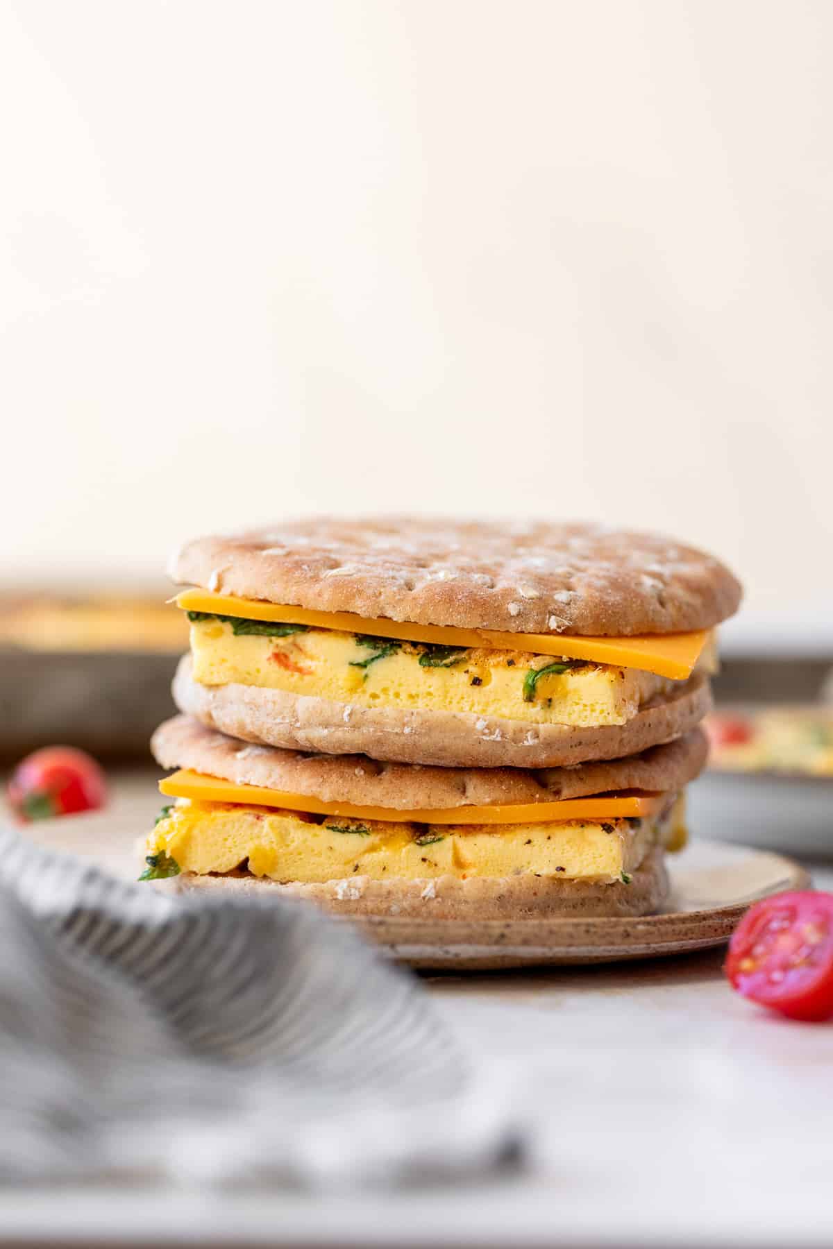 side view of a breakfast sandwich with sheet pan eggs inside