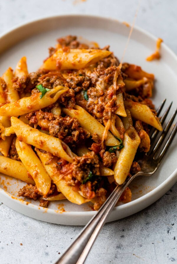 vegan baked ziti on a plate with a fork