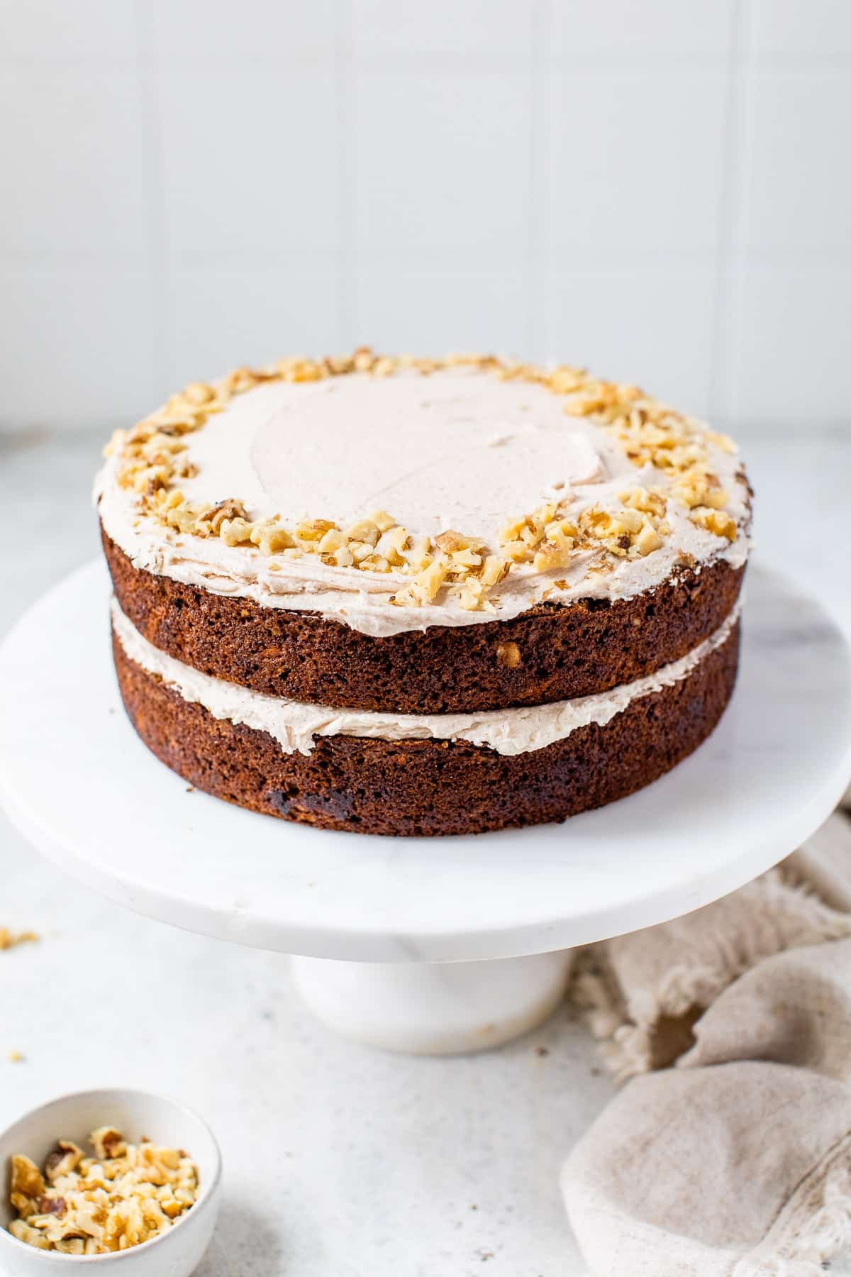 two layer cake on a cake stand