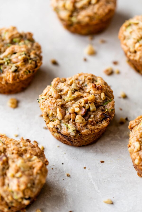 zucchini walnut muffins on a table